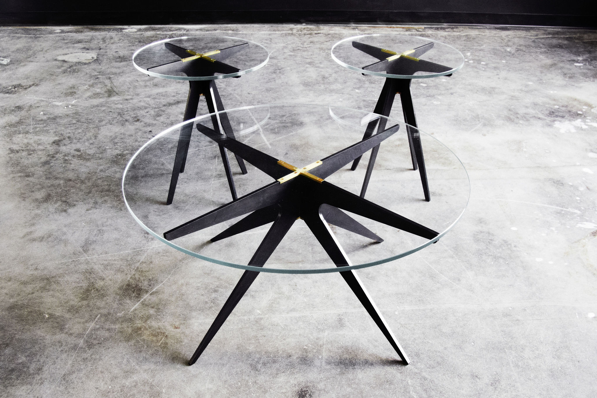 Twentieth GabrielScott DEAN RoundCoffeeTables Clear BlackBaseBrassAccent Group SITU