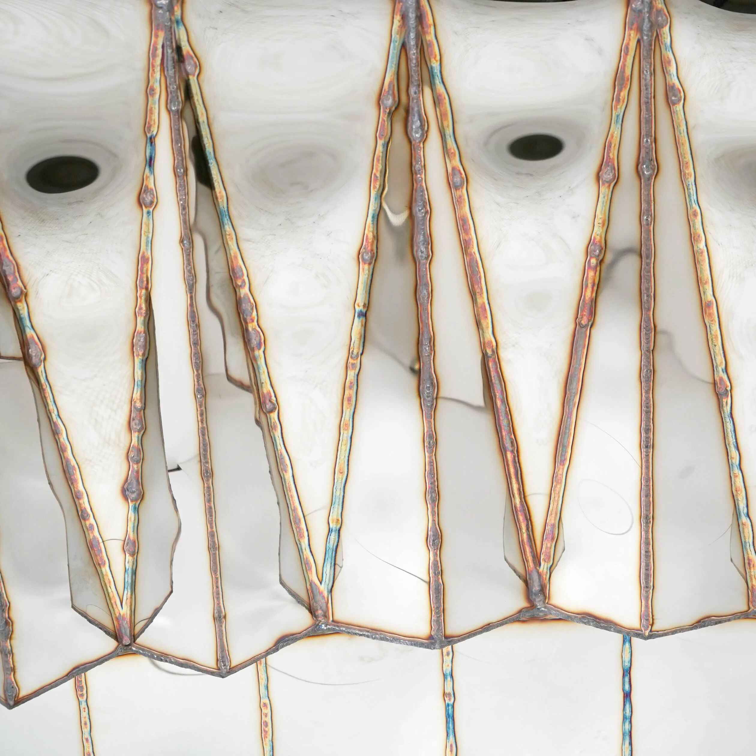 Jagged-Edge-Bar-in-Welded-Mirror-Polished-Stainless-Steel-by-Julian-Mayor-3-1.jpg