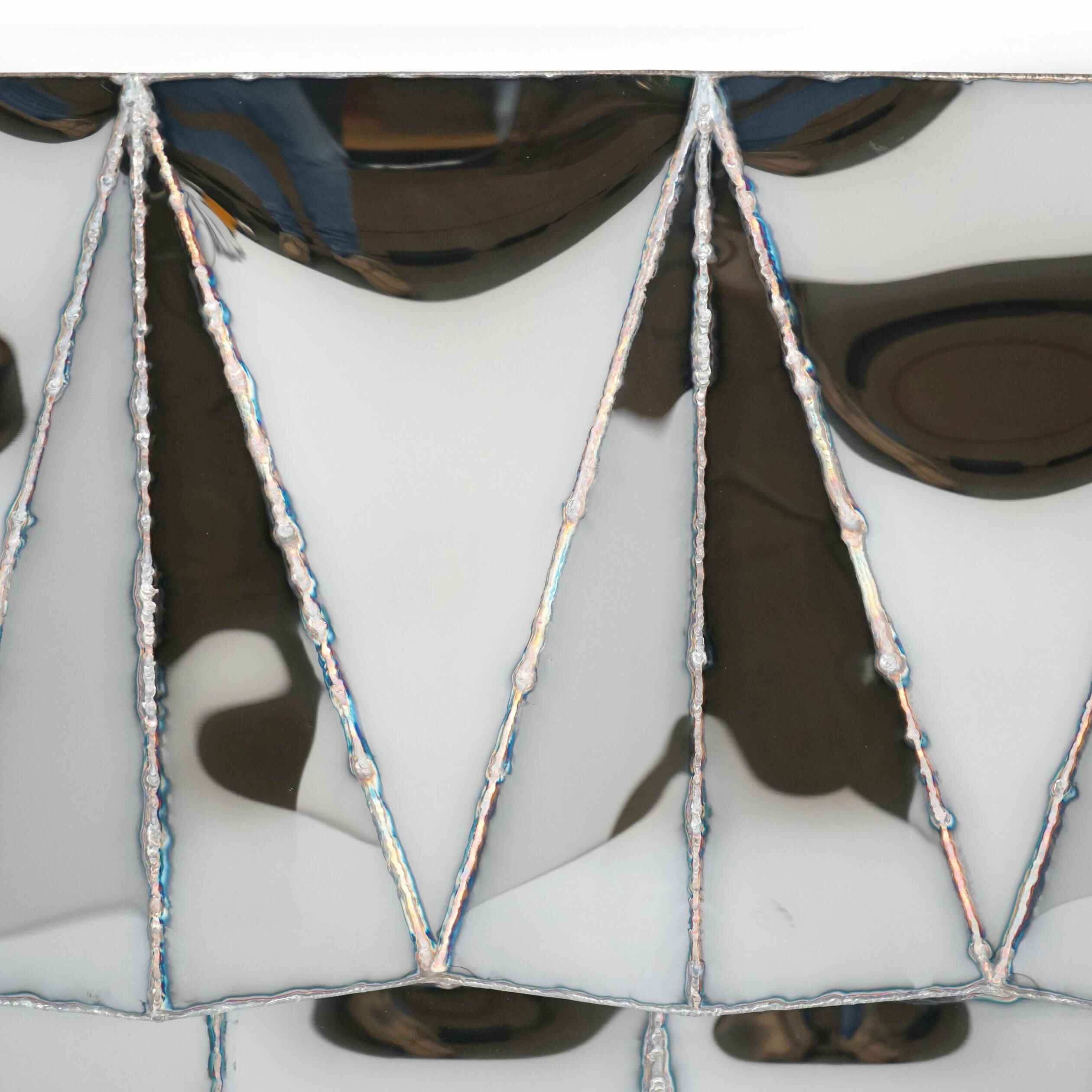 Jagged-Edge-Console-in-Welded-Mirror-Polished-Stainless-Steel-by-Julian-Mayor-3-1 (2)